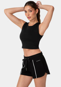 Side View-DOUBLE FRONT SEAMLESS CROPPED TANK WITH FOIL LOGO-BLACK