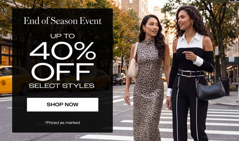 Two women walking on a city street during an outdoor fashion sale. A large promotional overlay on the left reads 'End of Season Event', 'UP TO 40% OFF', 'SELECT STYLES', and button reads 'SHOP NOW'.