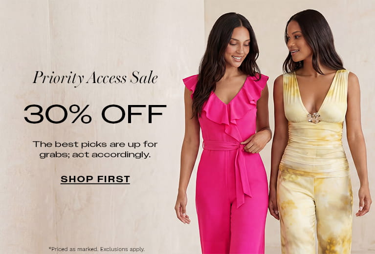 Two women standing side-by-side in stylish summer outfits; one wears a vibrant pink ruffled jumpsuit and the other wears a yellow and white marble-patterned sleeveless top with matching trousers. To their left, promotional text reads "Priority Access Sale 30% OFF" with a "Shop First" call to action.