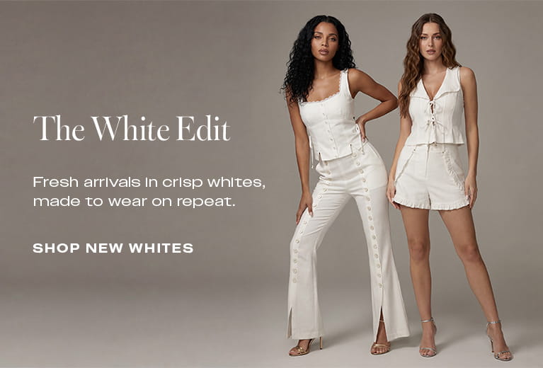 Two women wearing white outfits with promotional text on a gray background with CTA shop new whites.