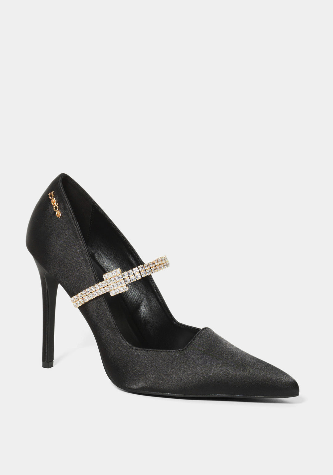 Black high-heeled shoe with a decorative strap on a white background