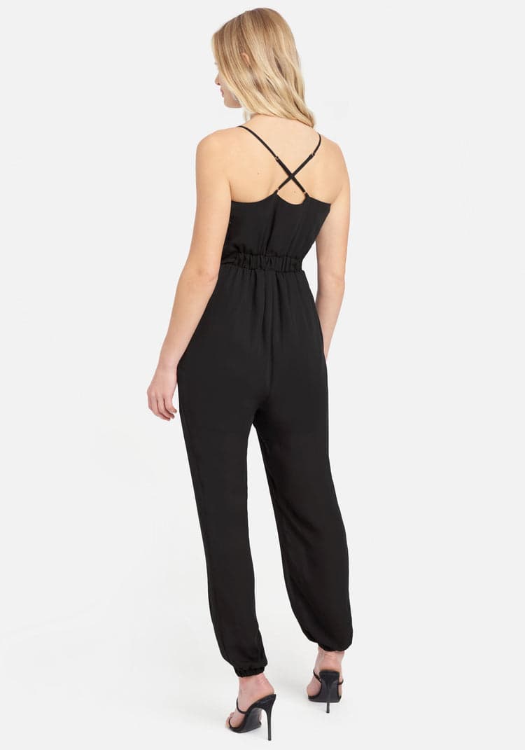 Smocked Cuff Woven Jumpsuit | bebe